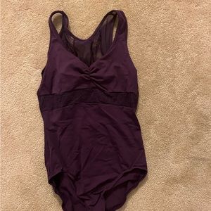 purple leotard with a lacey back